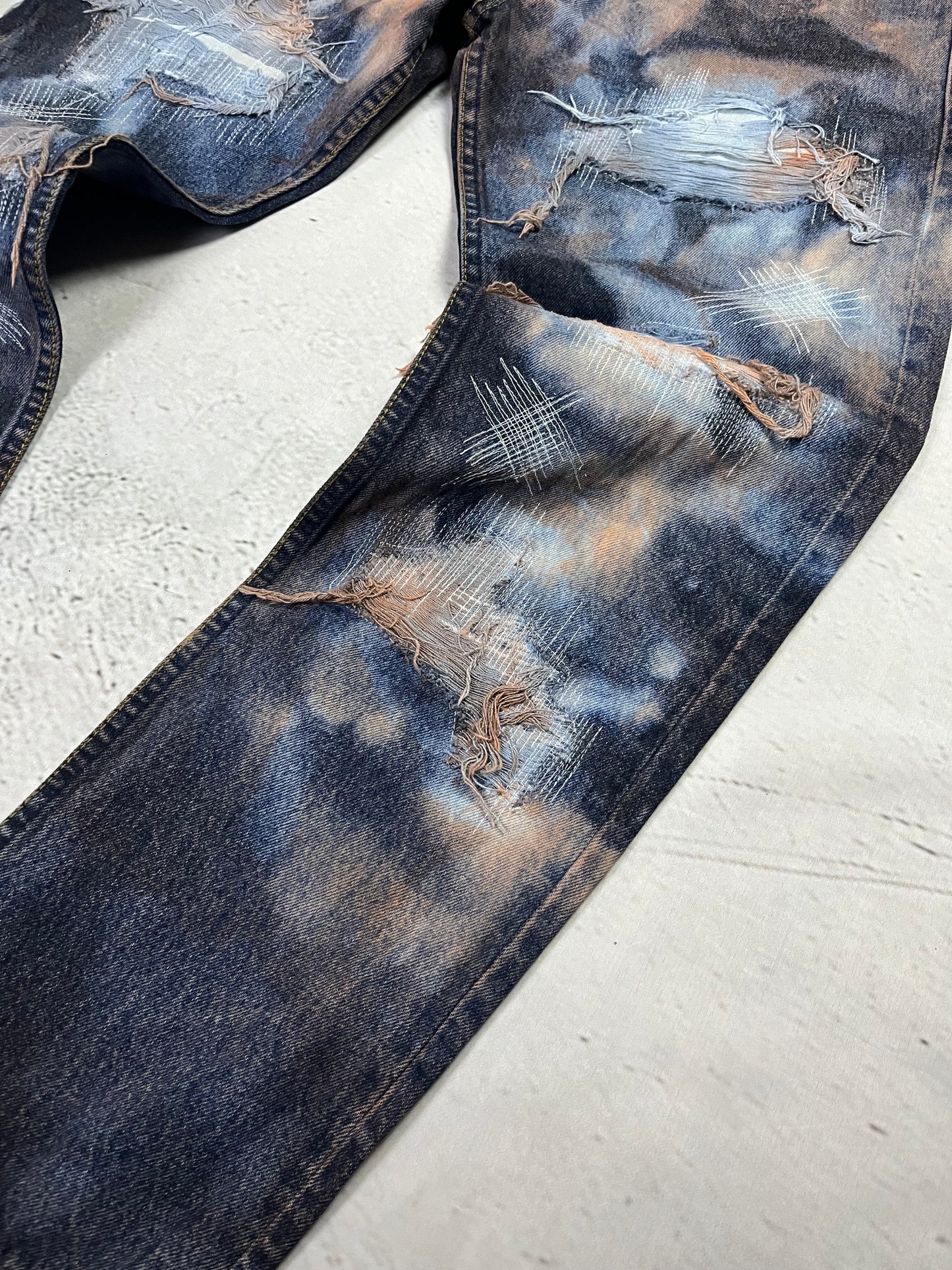BLEACHED DISTRESSED DENIM