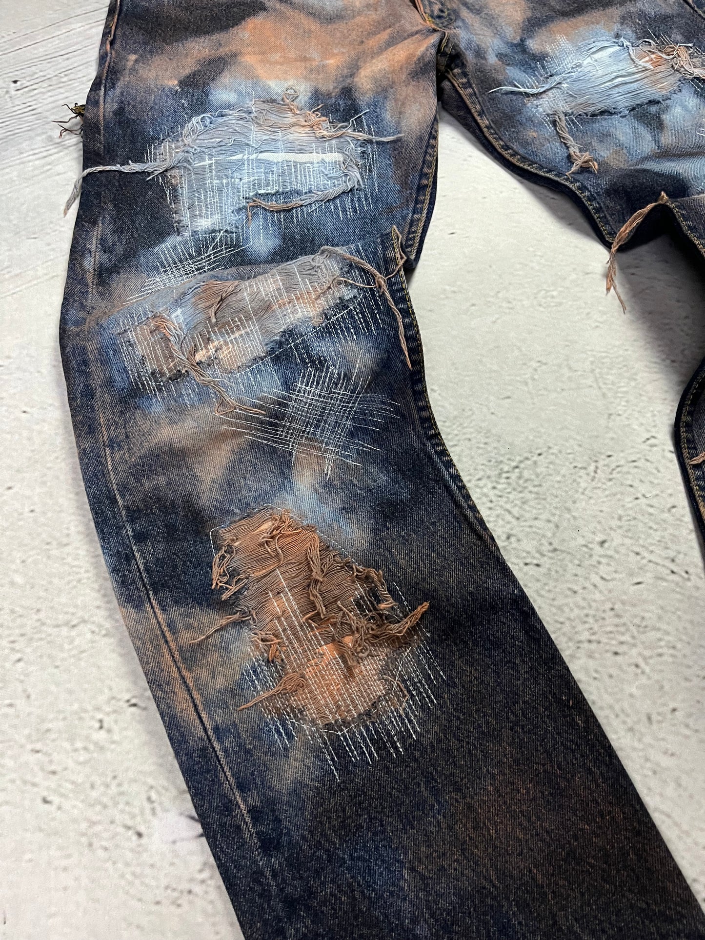 BLEACHED DISTRESSED DENIM