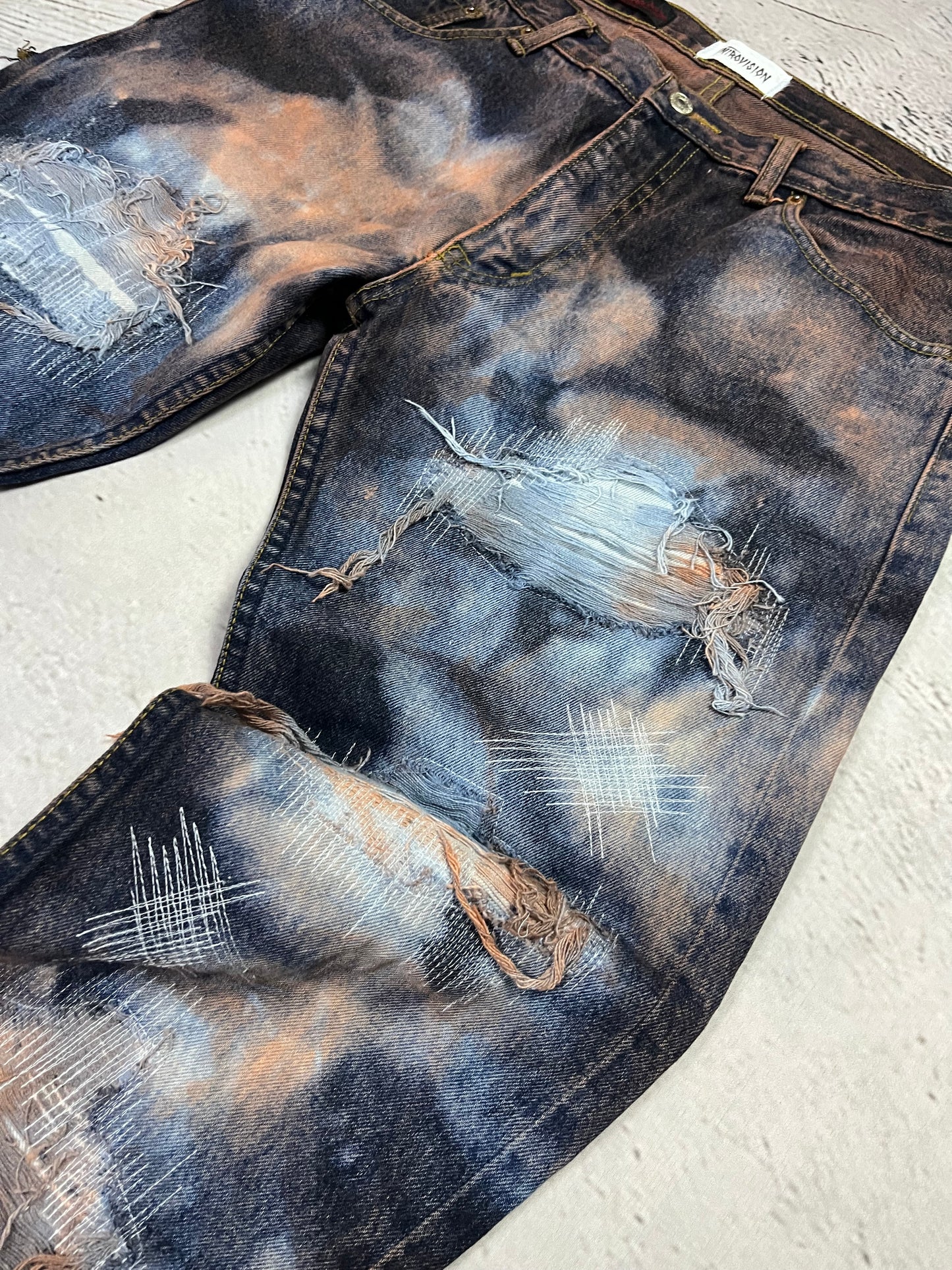 BLEACHED DISTRESSED DENIM