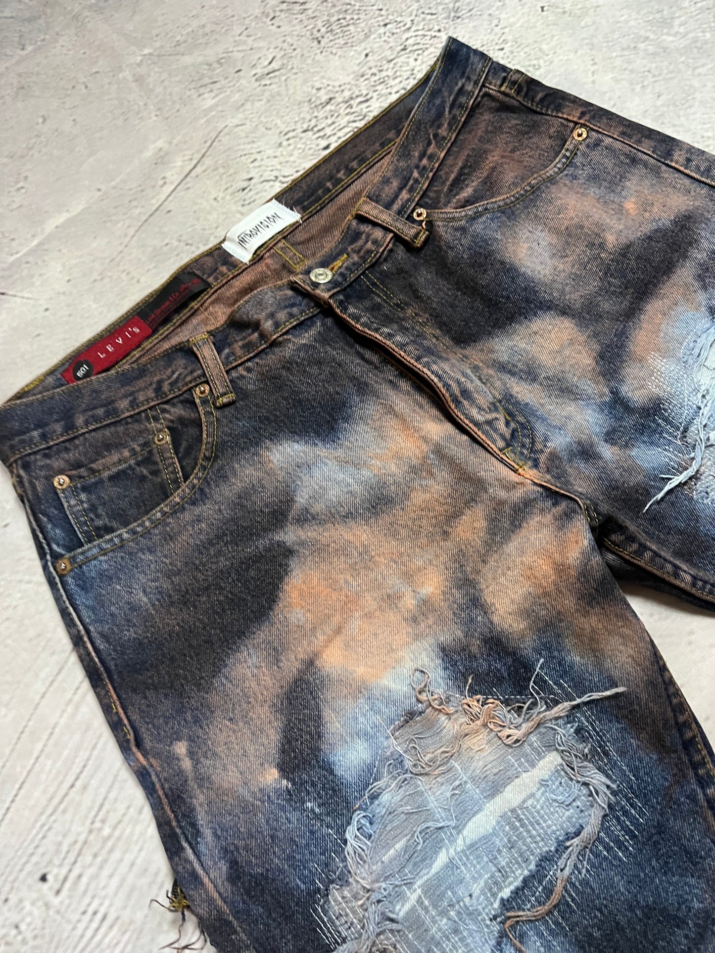 BLEACHED DISTRESSED DENIM