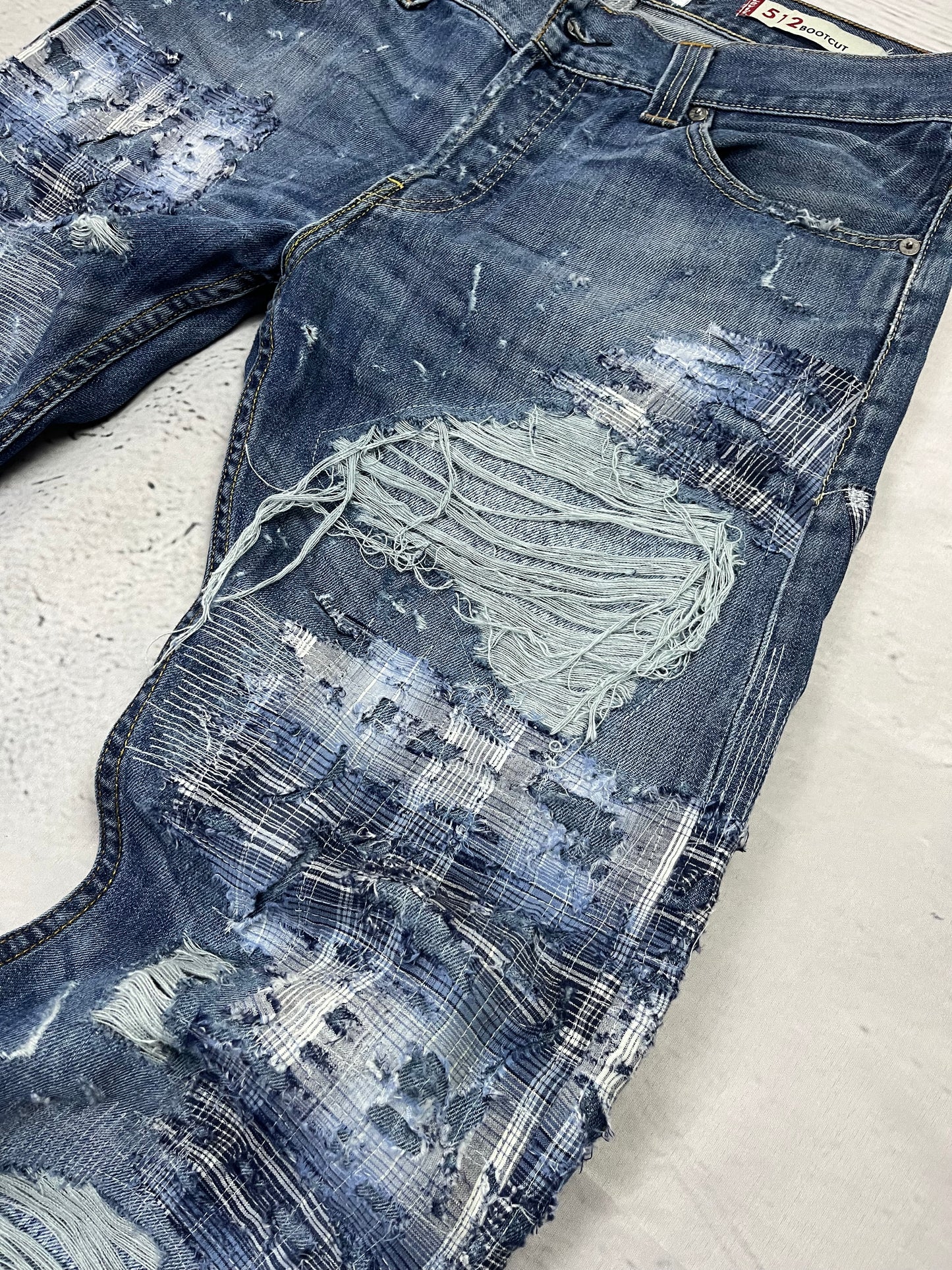 RIPPED PLAID PATCH DENIM
