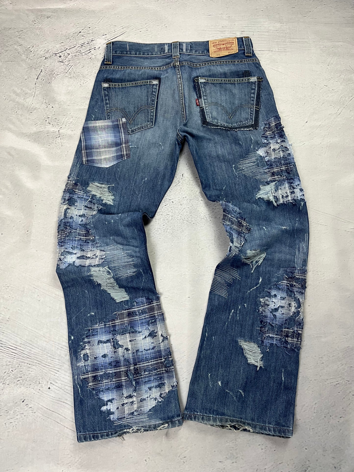 RIPPED PLAID PATCH DENIM