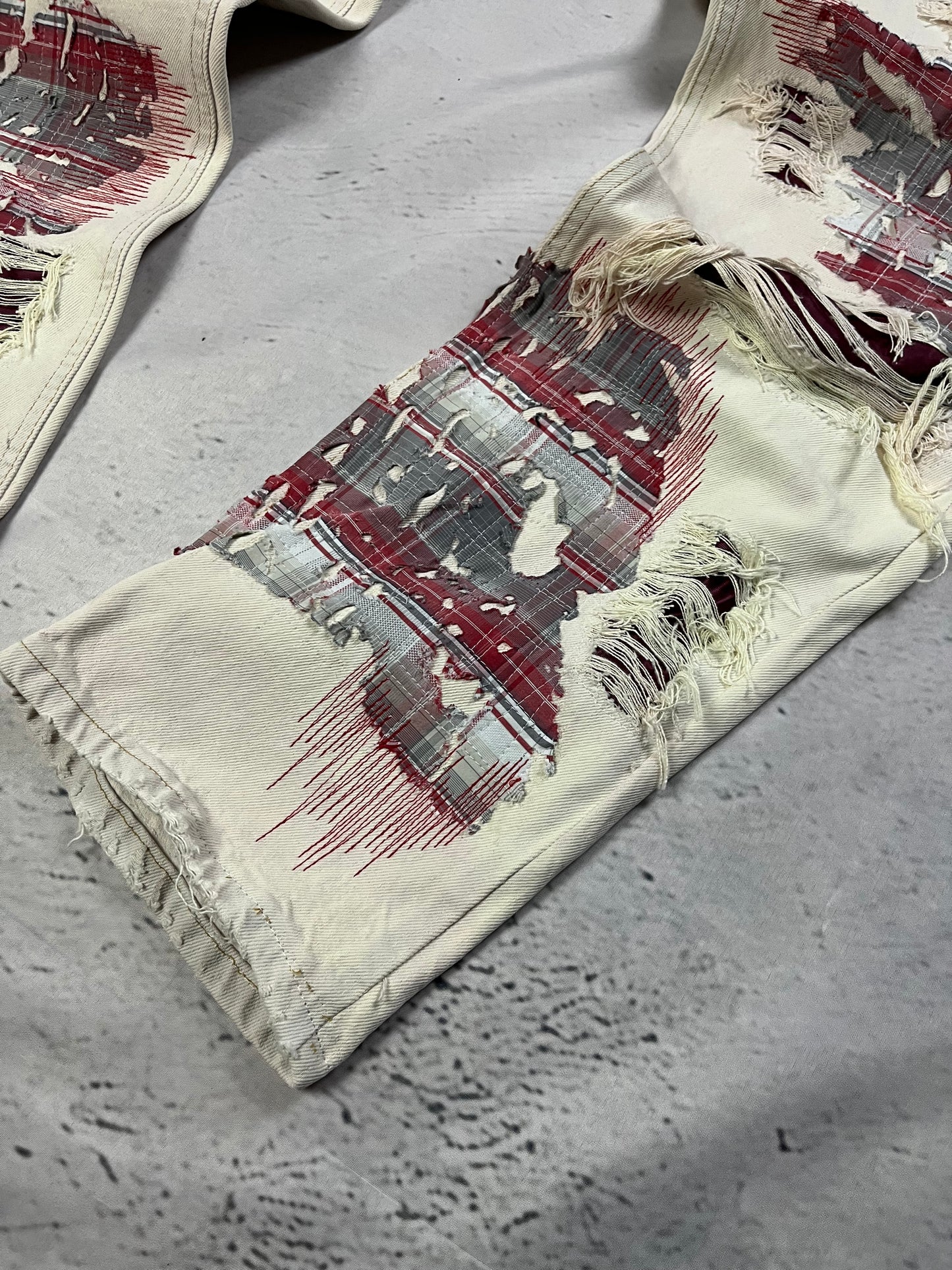 DISTRESSED PLAID PATCH DENIM