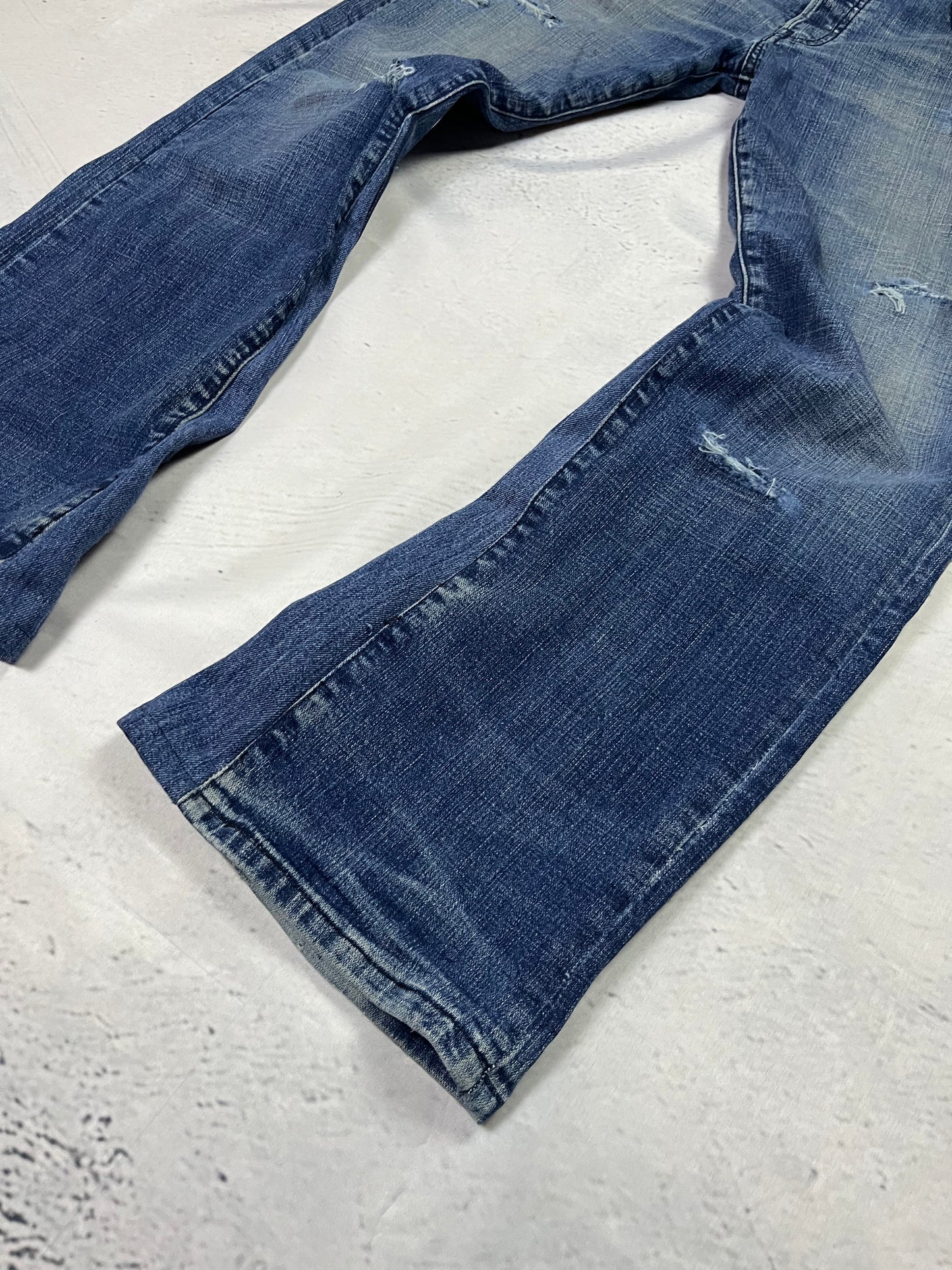 REWORKED POCKET FLARE DENIM