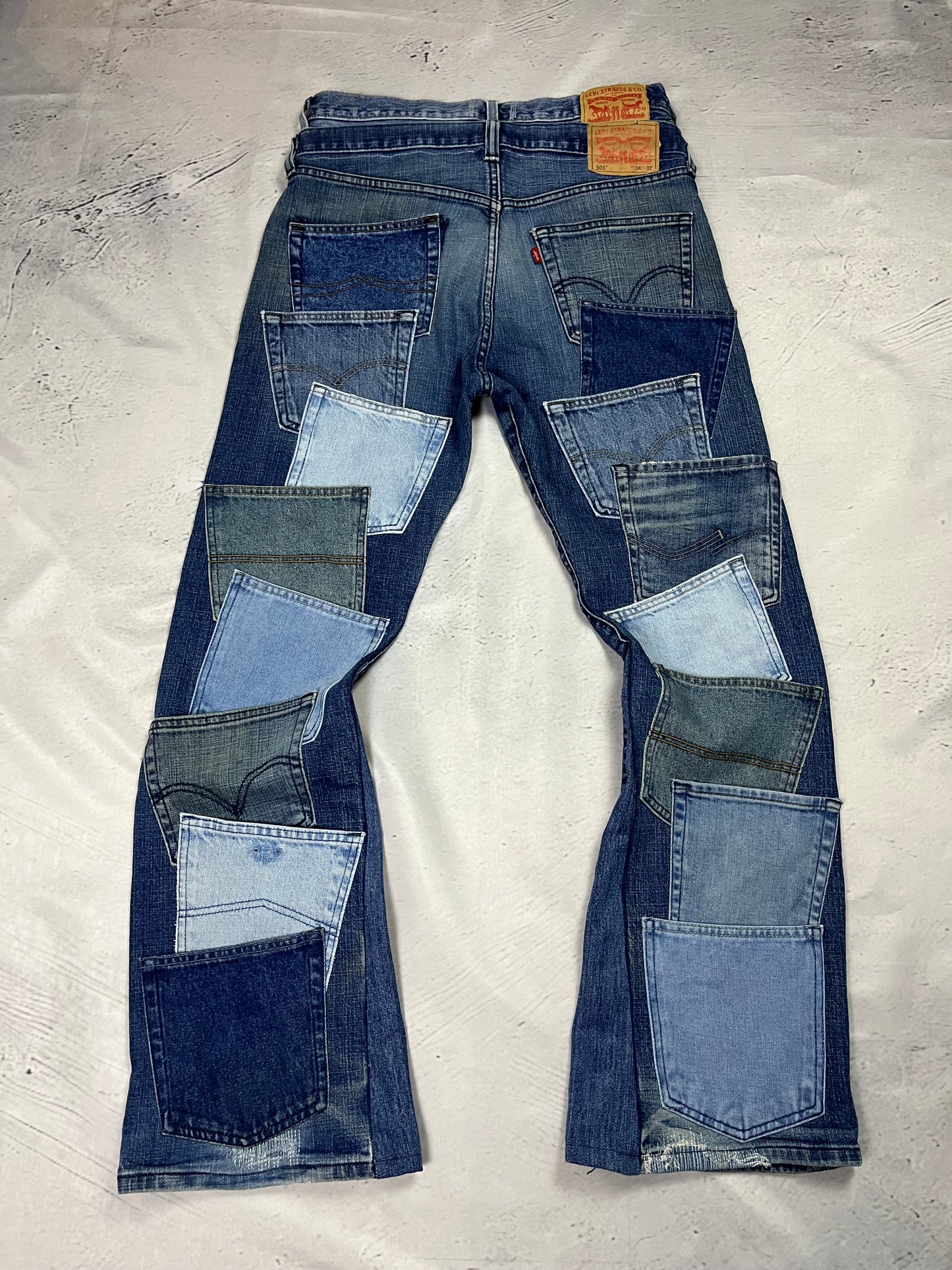 REWORKED POCKET FLARE DENIM