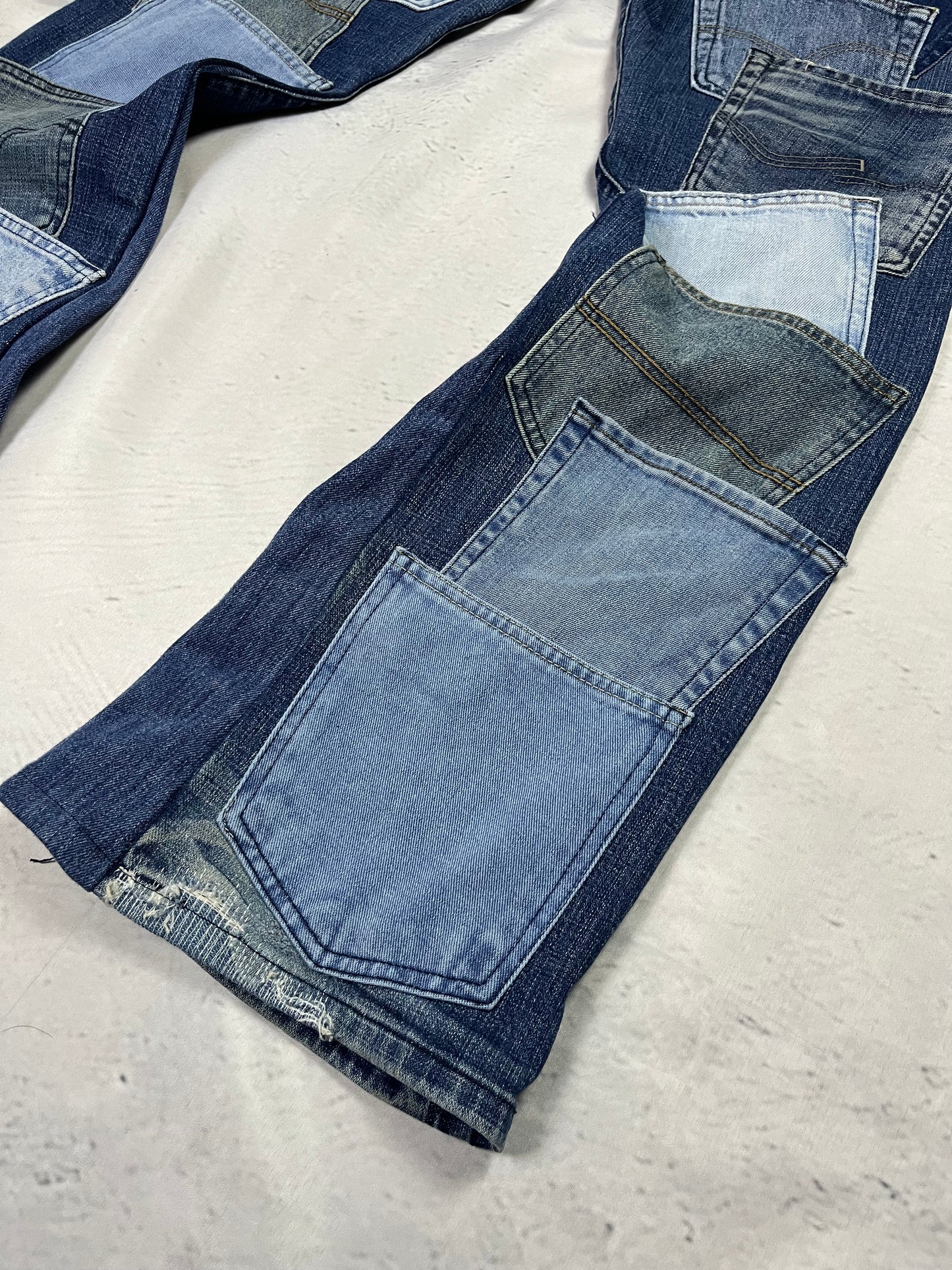 REWORKED POCKET FLARE DENIM