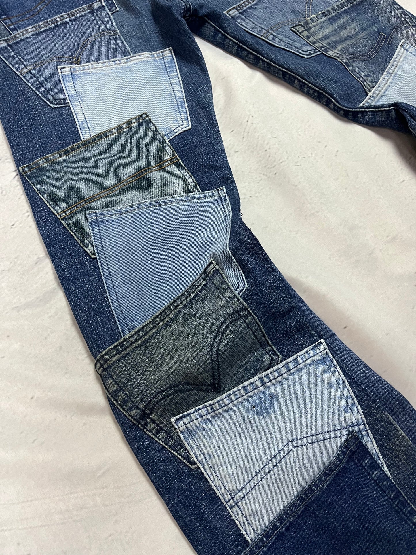 REWORKED POCKET FLARE DENIM