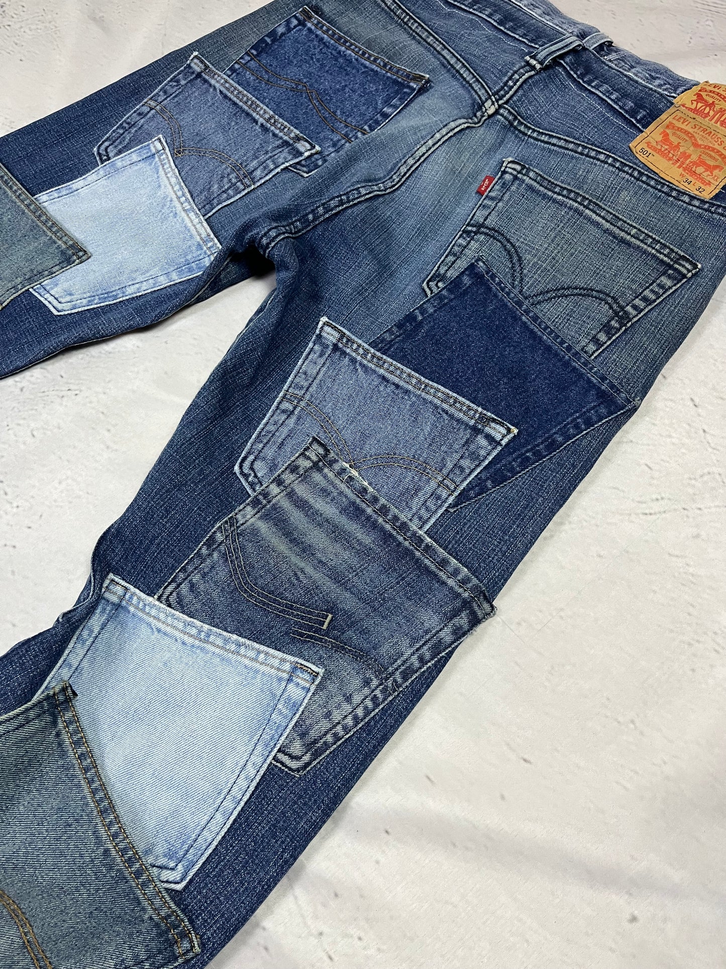 REWORKED POCKET FLARE DENIM