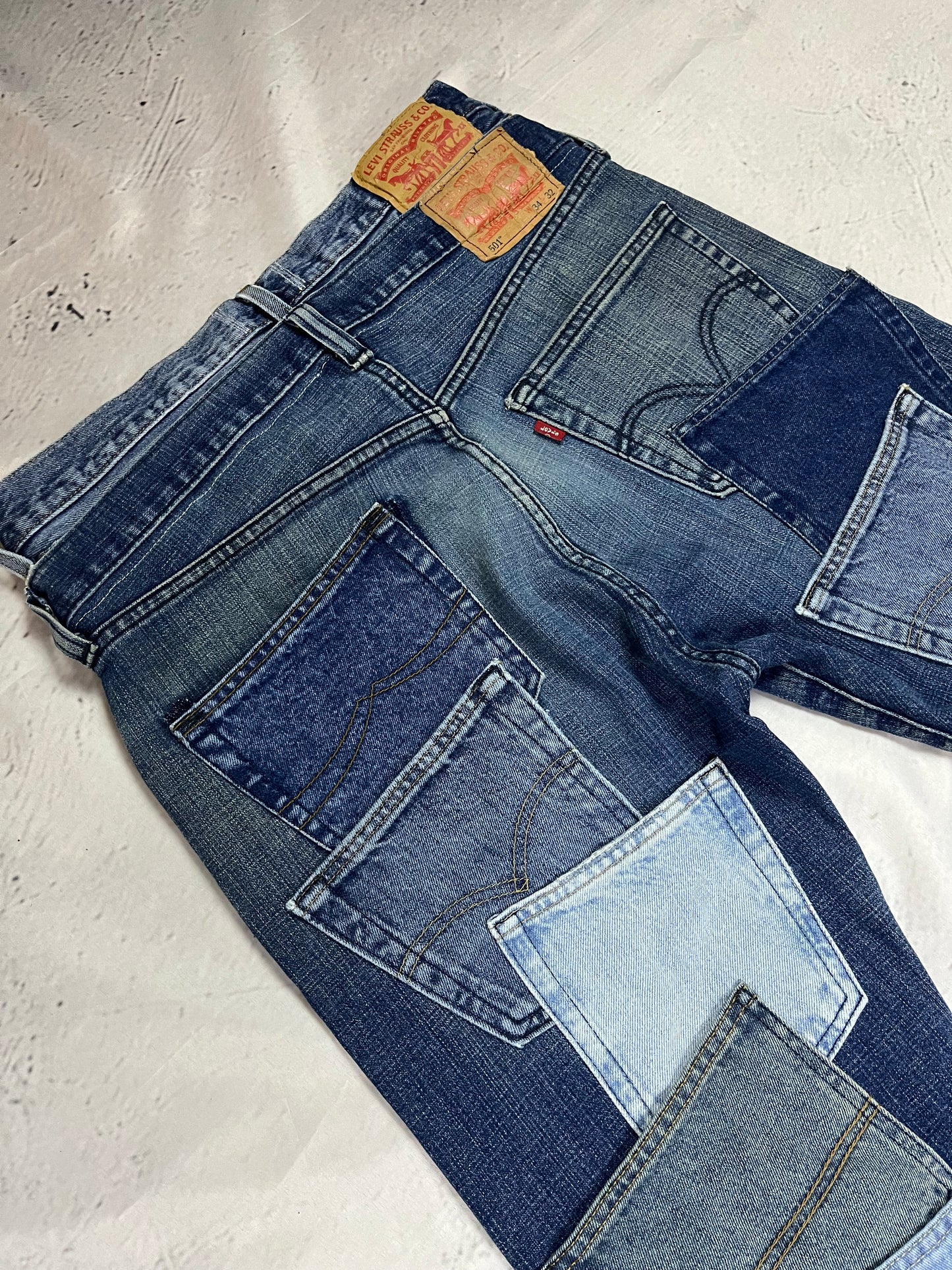 REWORKED POCKET FLARE DENIM