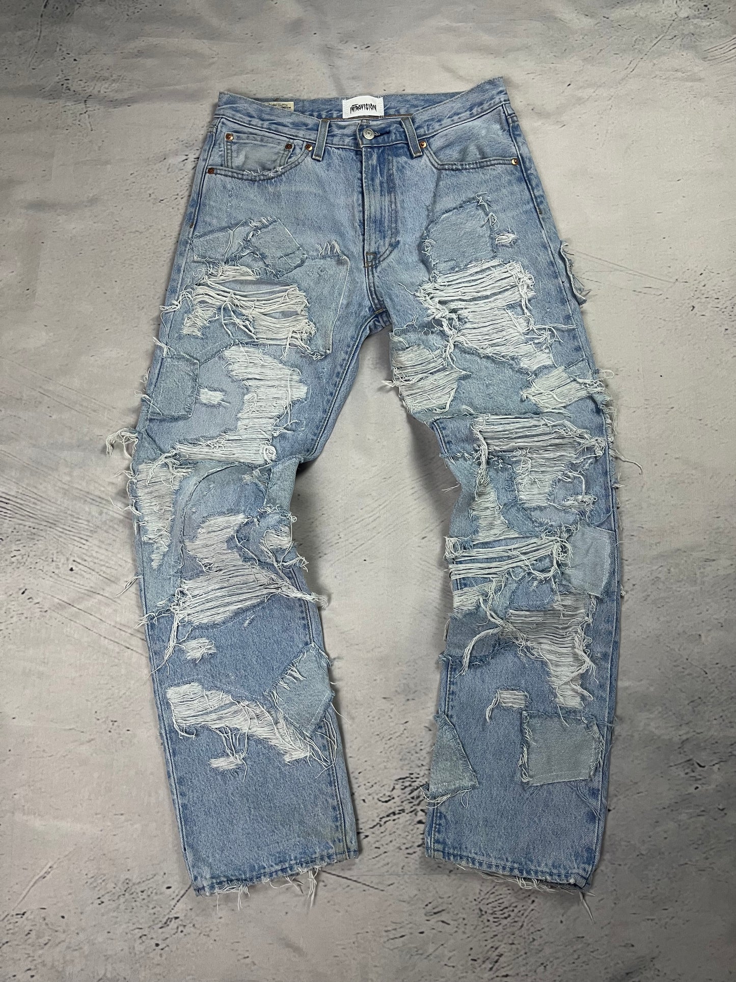 RIPPED RECONSTRUCTION DENIM