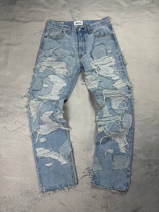 RIPPED RECONSTRUCTION DENIM
