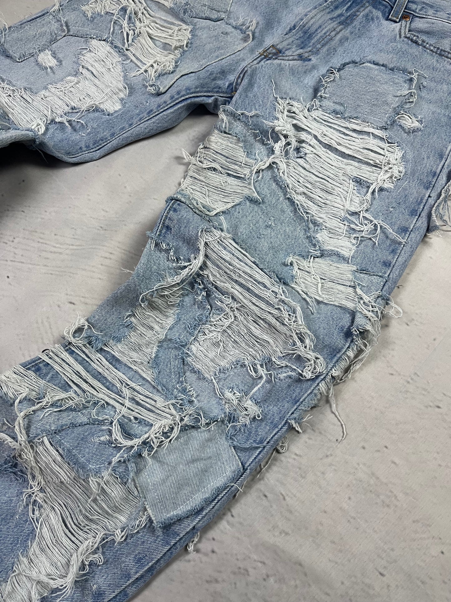 RIPPED RECONSTRUCTION DENIM