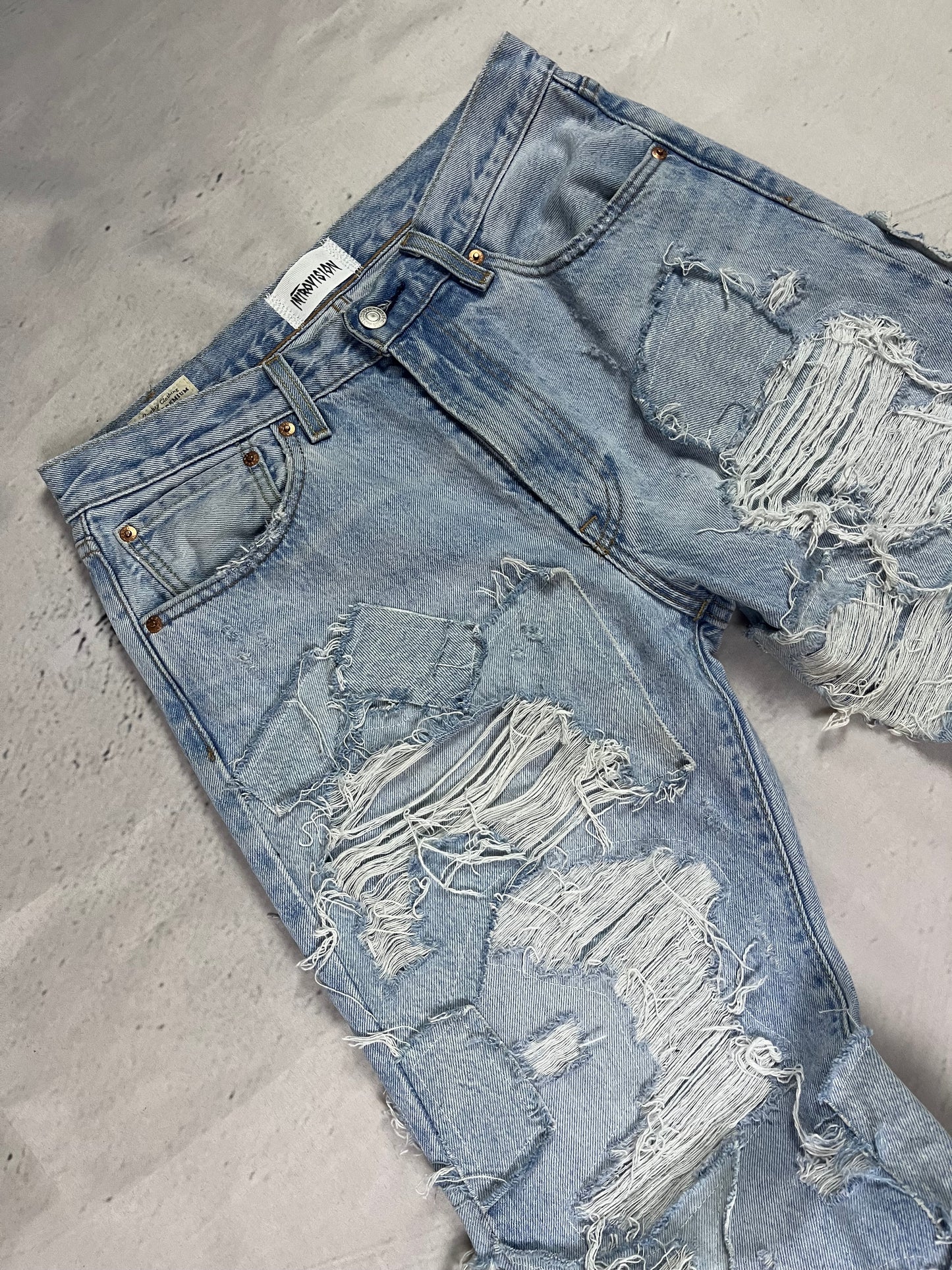 RIPPED RECONSTRUCTION DENIM