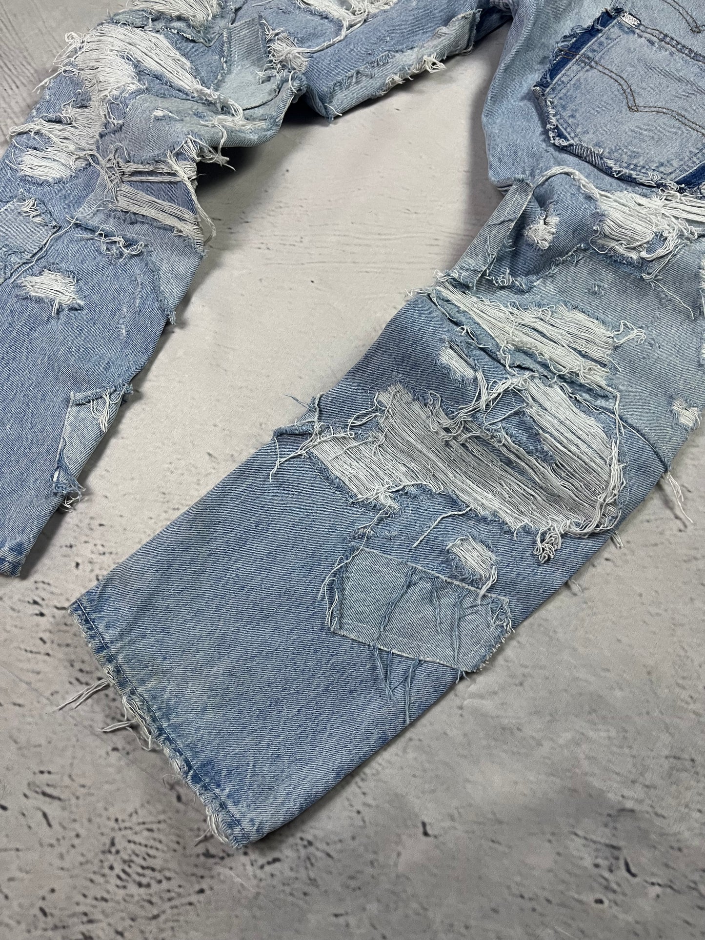 RIPPED RECONSTRUCTION DENIM