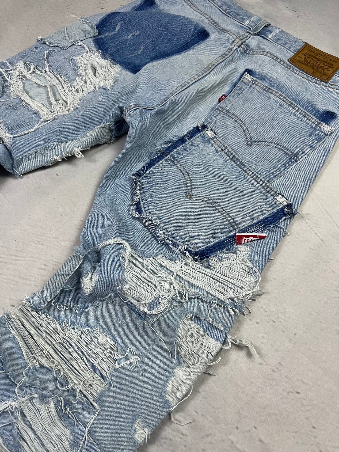 RIPPED RECONSTRUCTION DENIM
