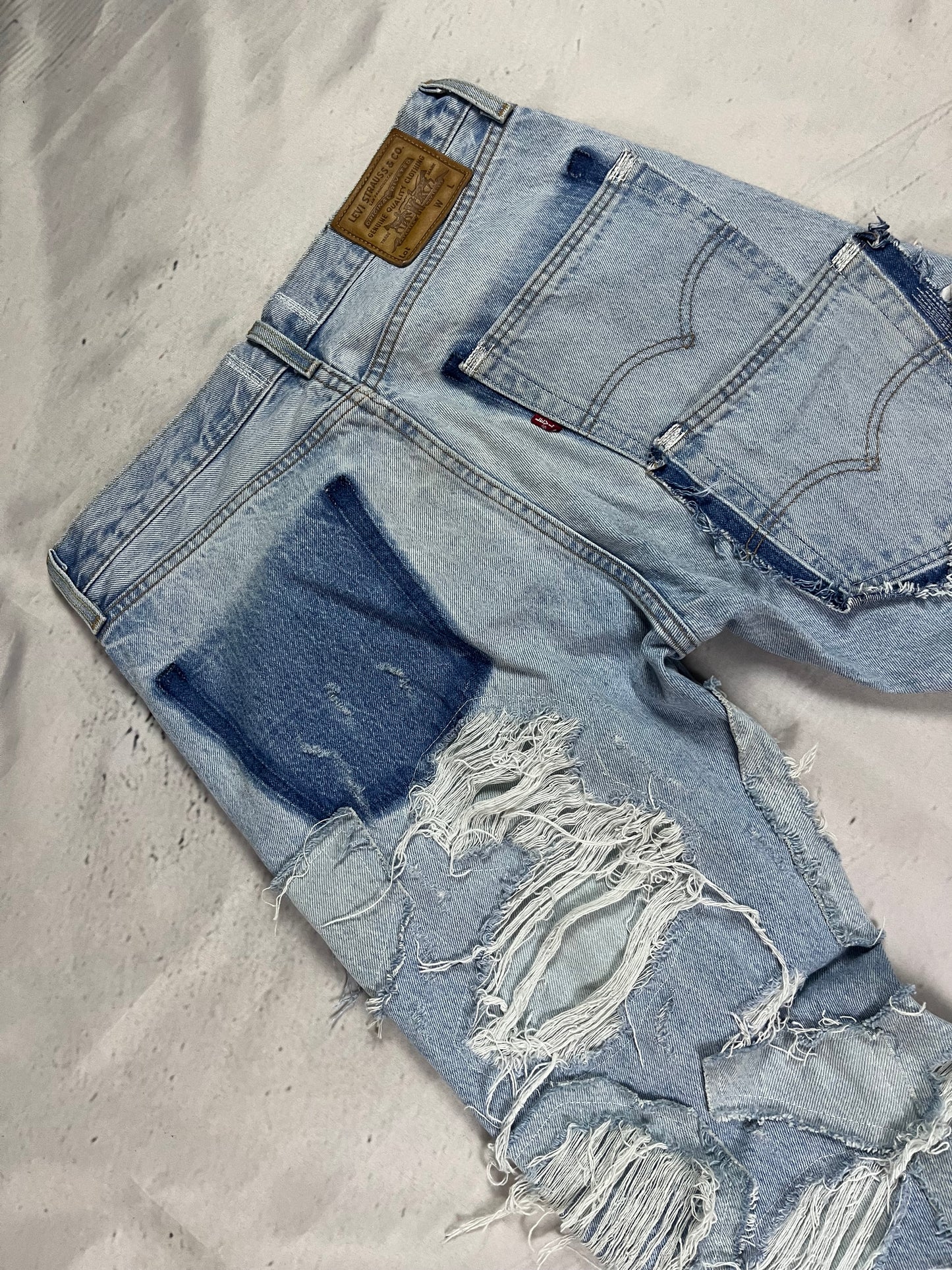 RIPPED RECONSTRUCTION DENIM