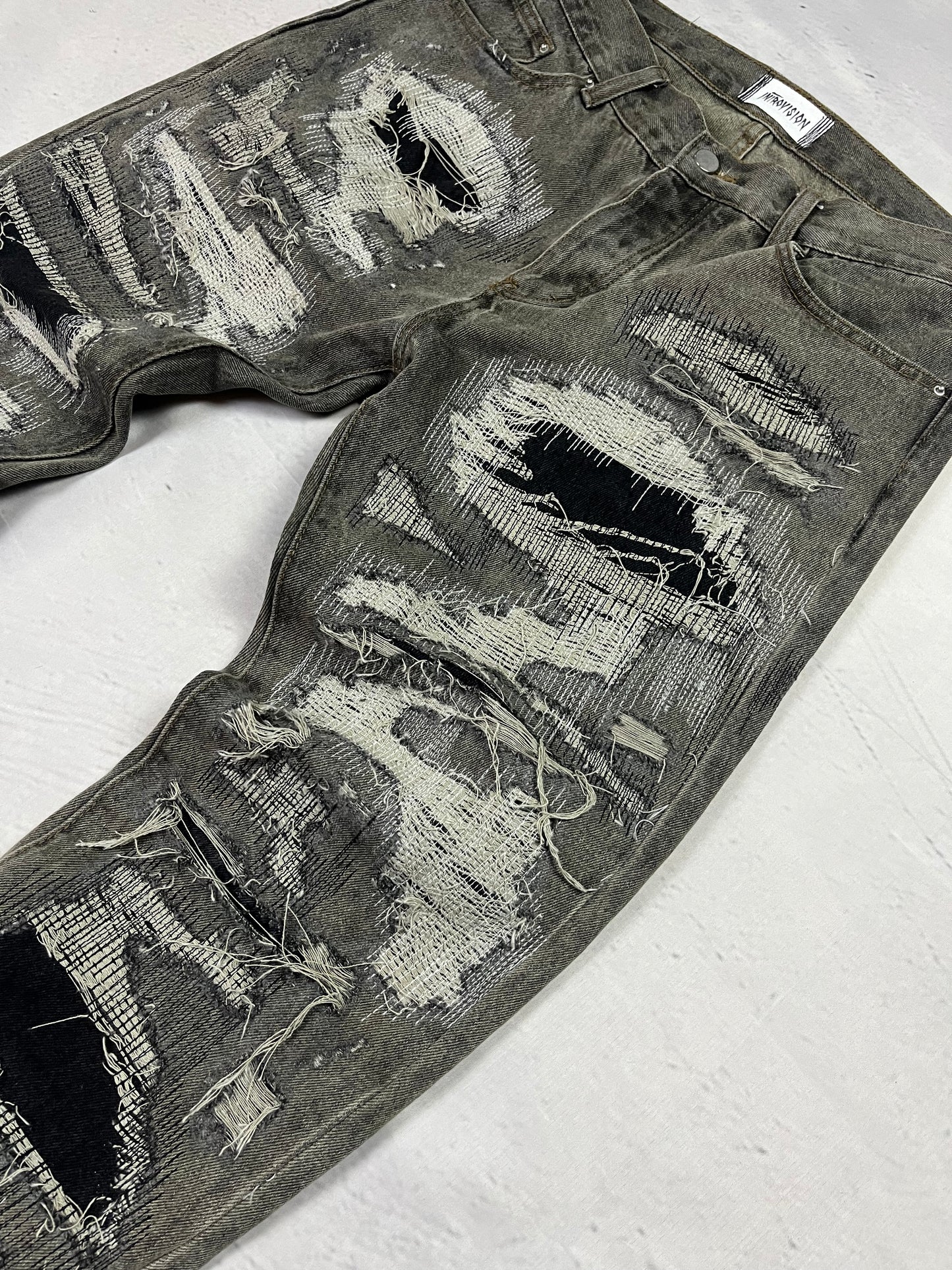 FRACTURED DENIM