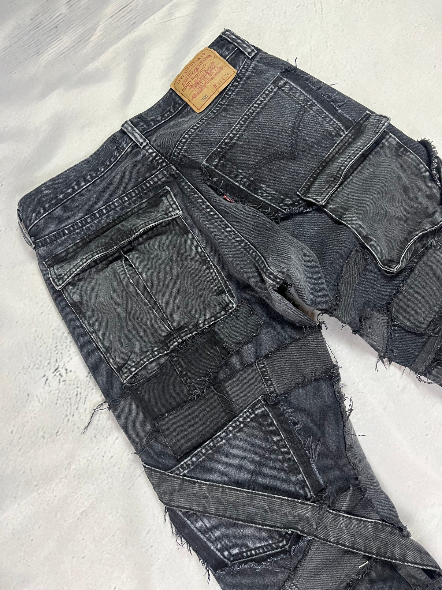 DISTRESSED CARGO PATCH DENIM