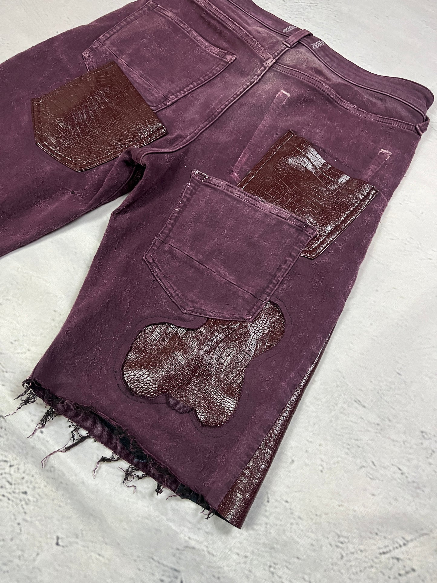 CRIMSON REPTILE DENIM