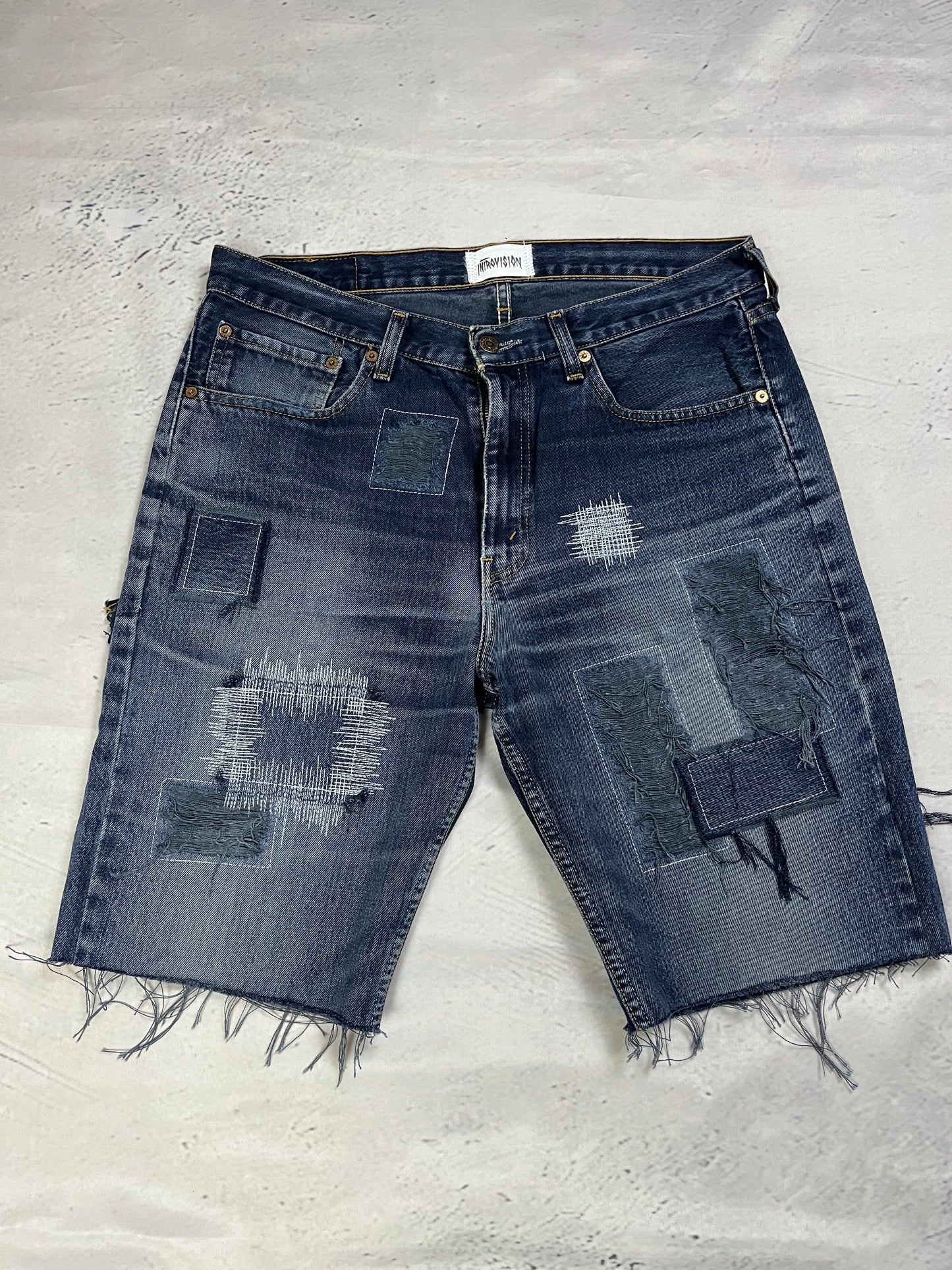 RAW STITCH DENIM SHORTS