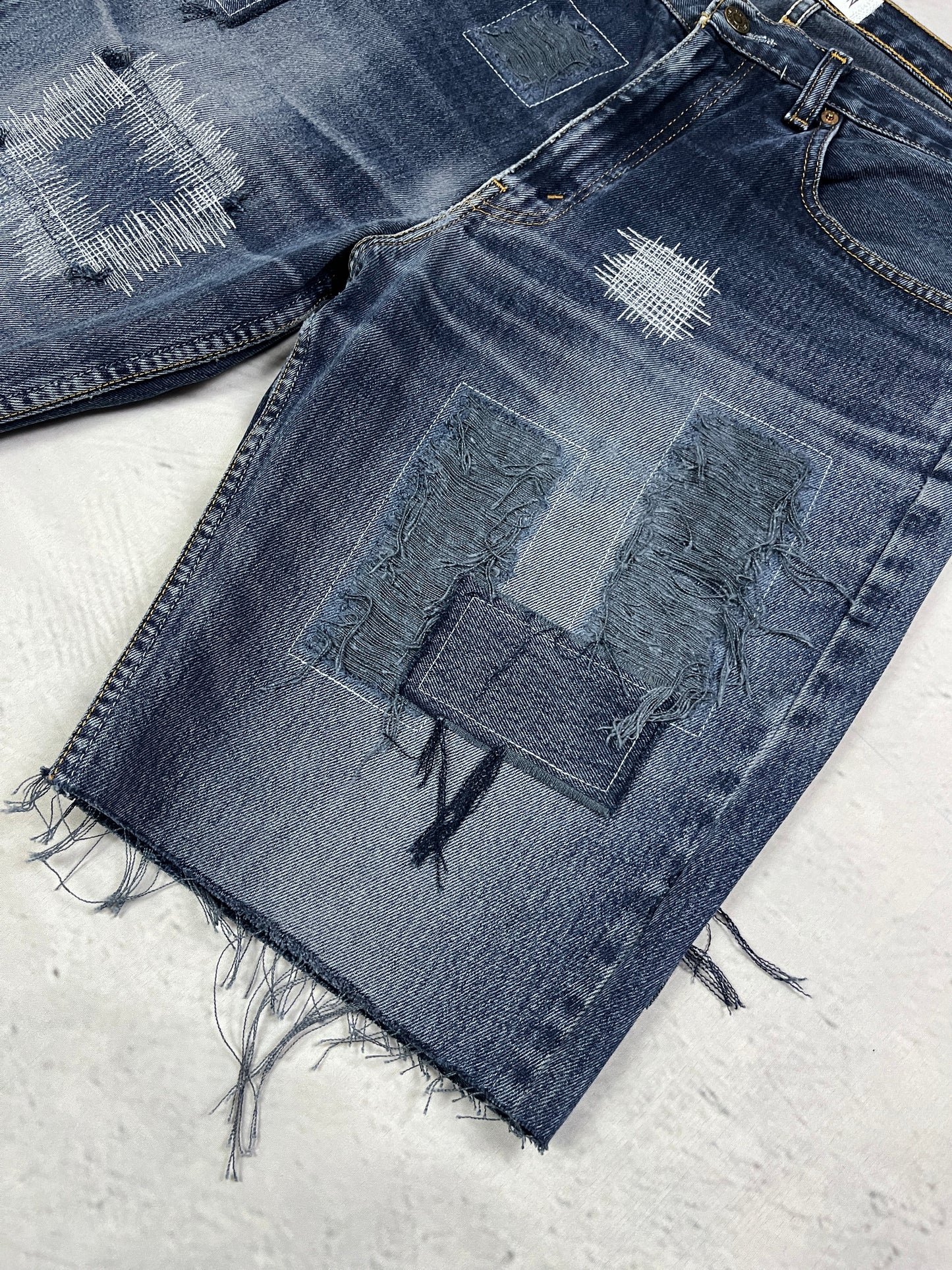 RAW STITCH DENIM SHORTS