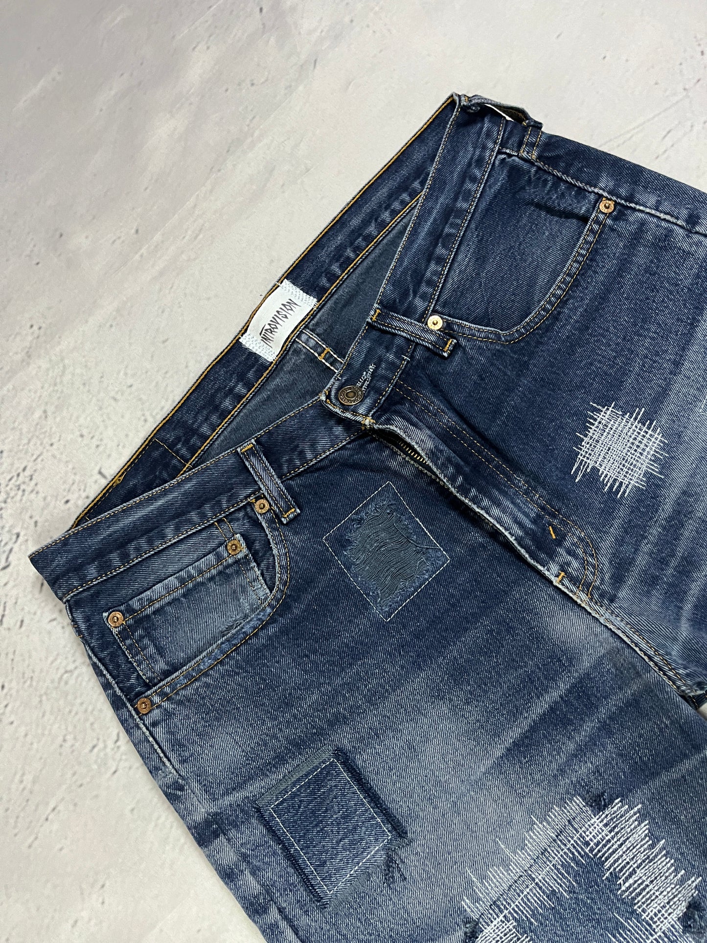 RAW STITCH DENIM SHORTS