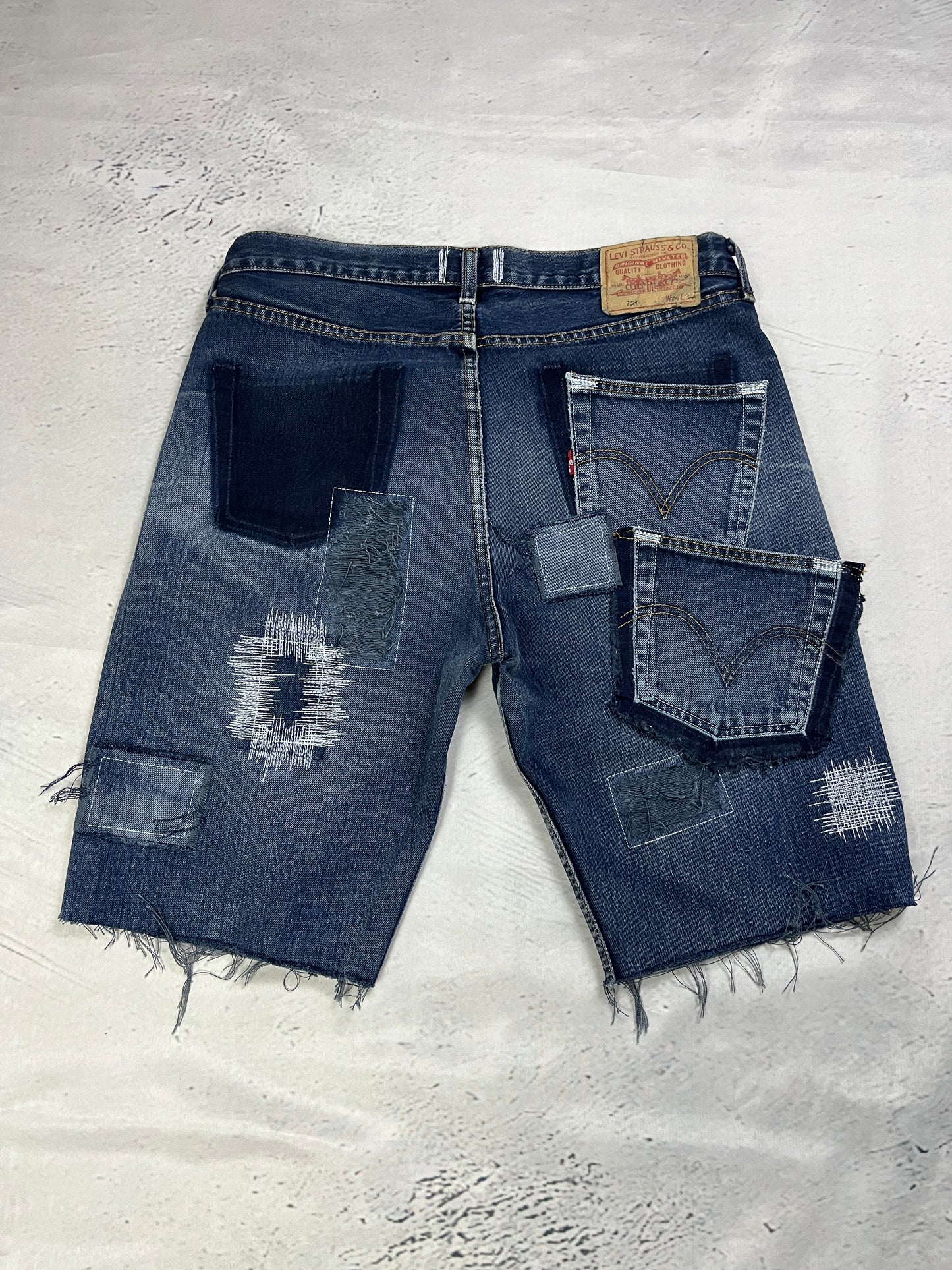 RAW STITCH DENIM SHORTS