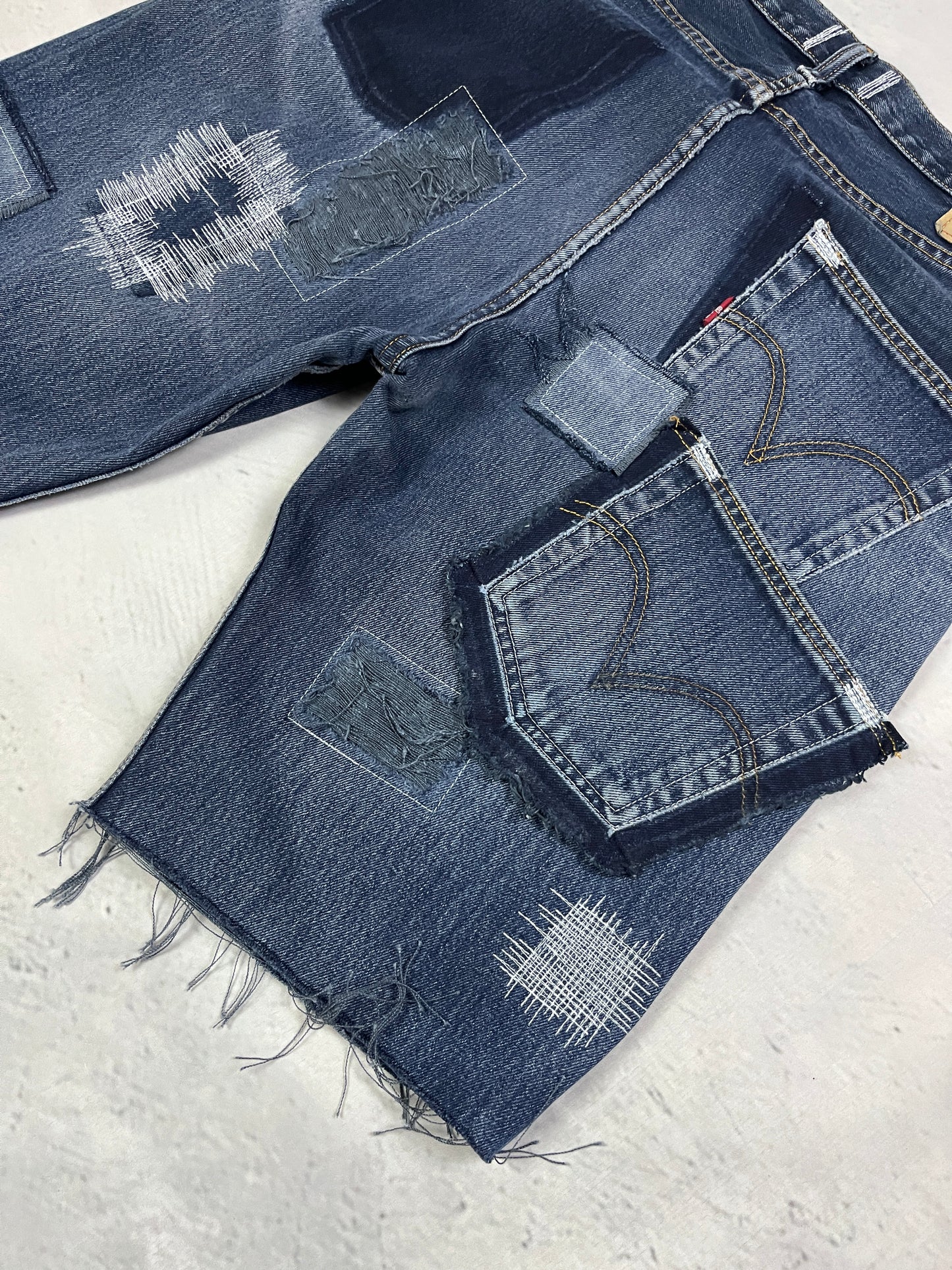 RAW STITCH DENIM SHORTS