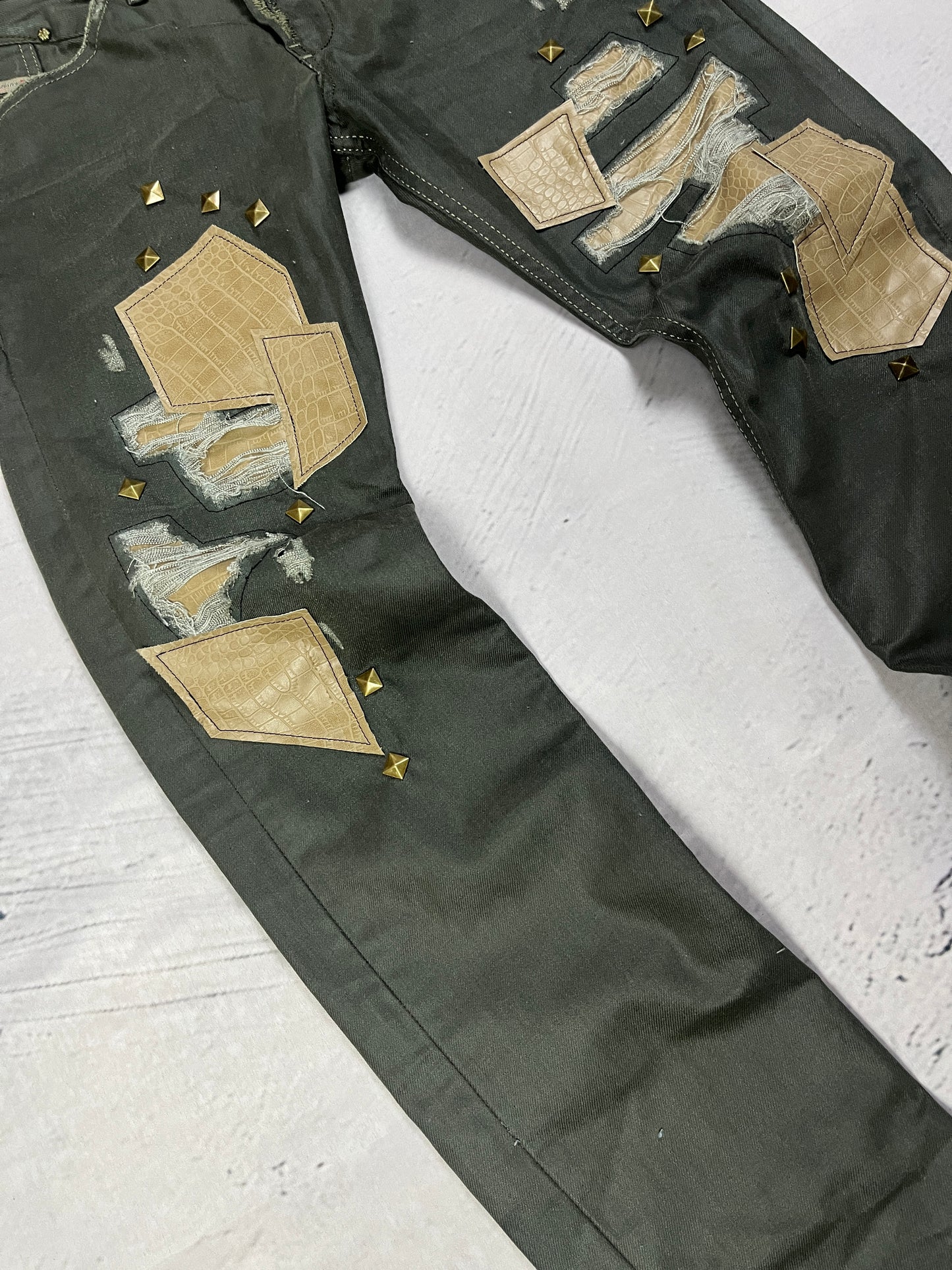 STUDDED PATCHWORK DENIM