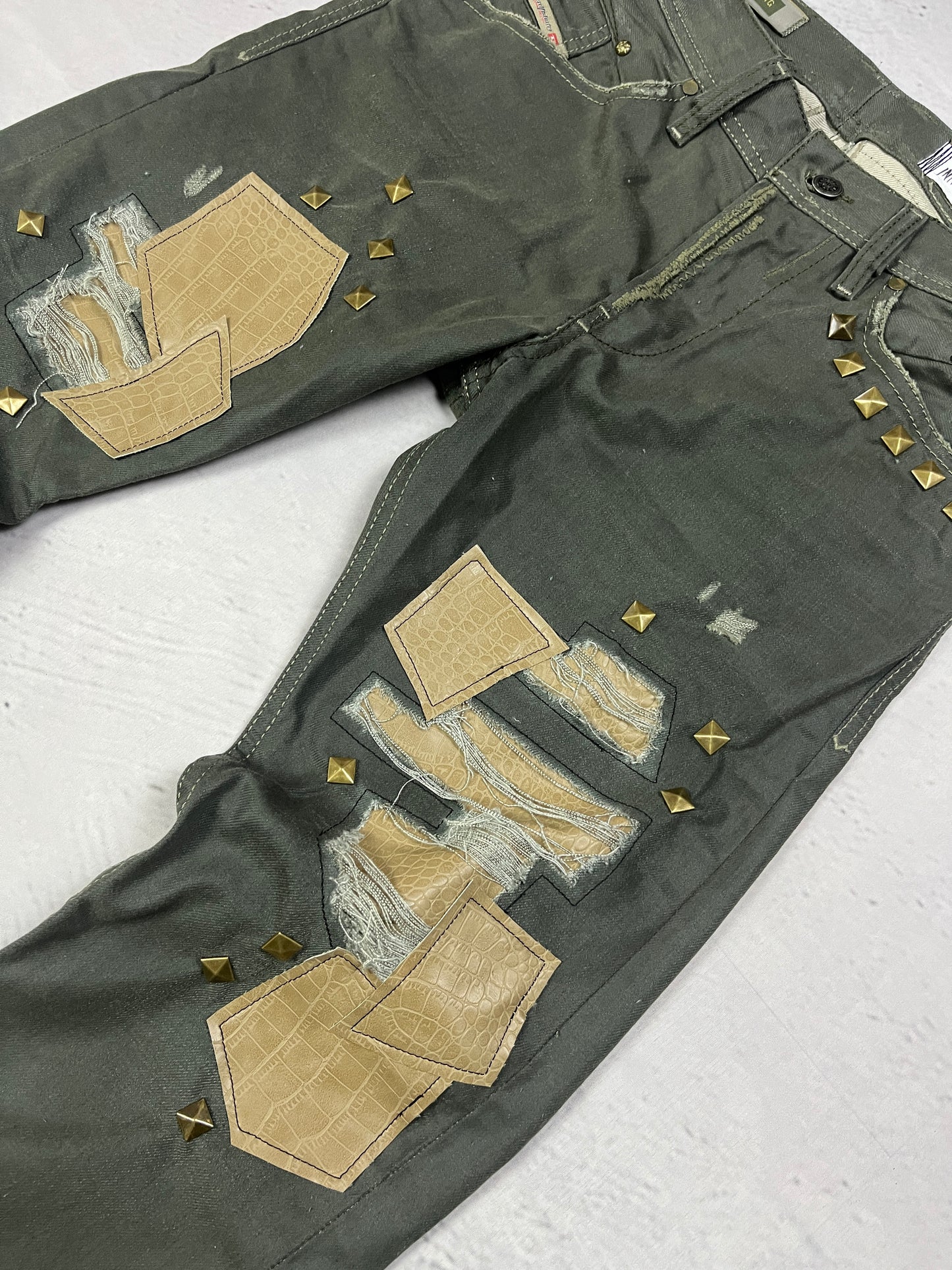 STUDDED PATCHWORK DENIM