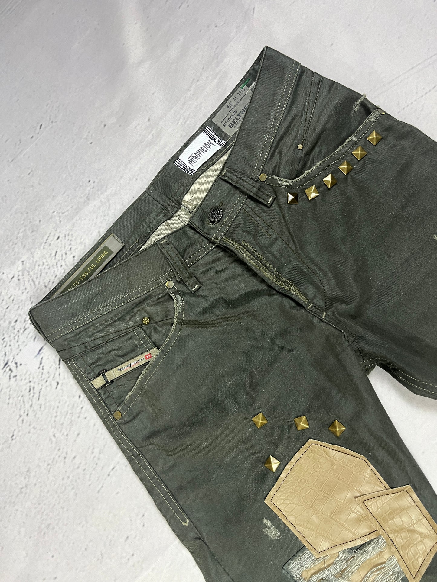 STUDDED PATCHWORK DENIM