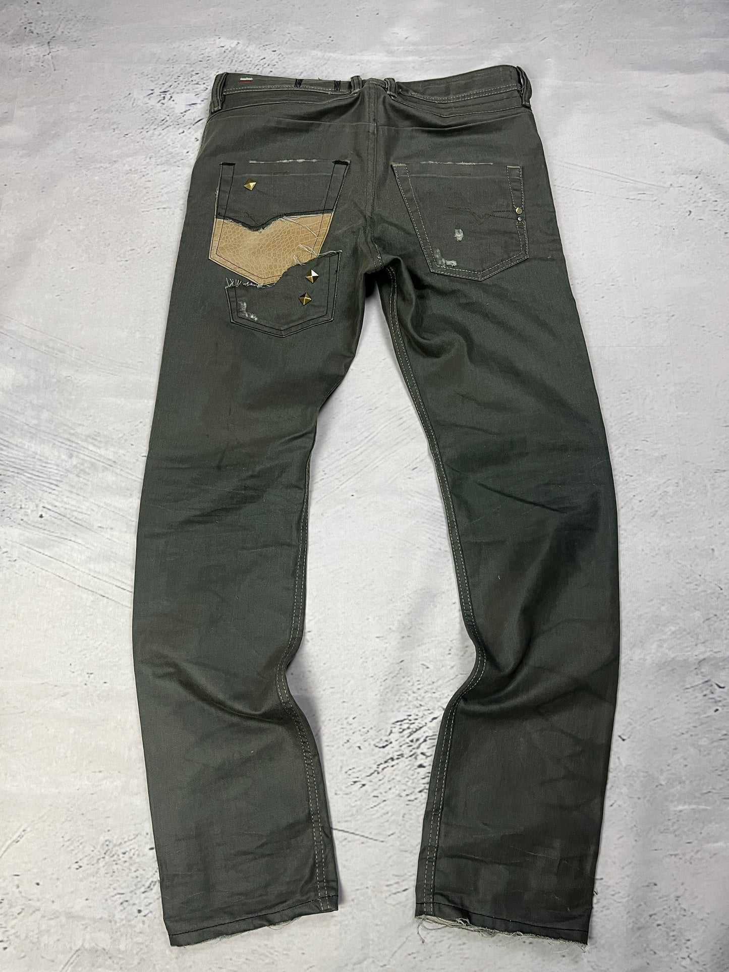 STUDDED PATCHWORK DENIM