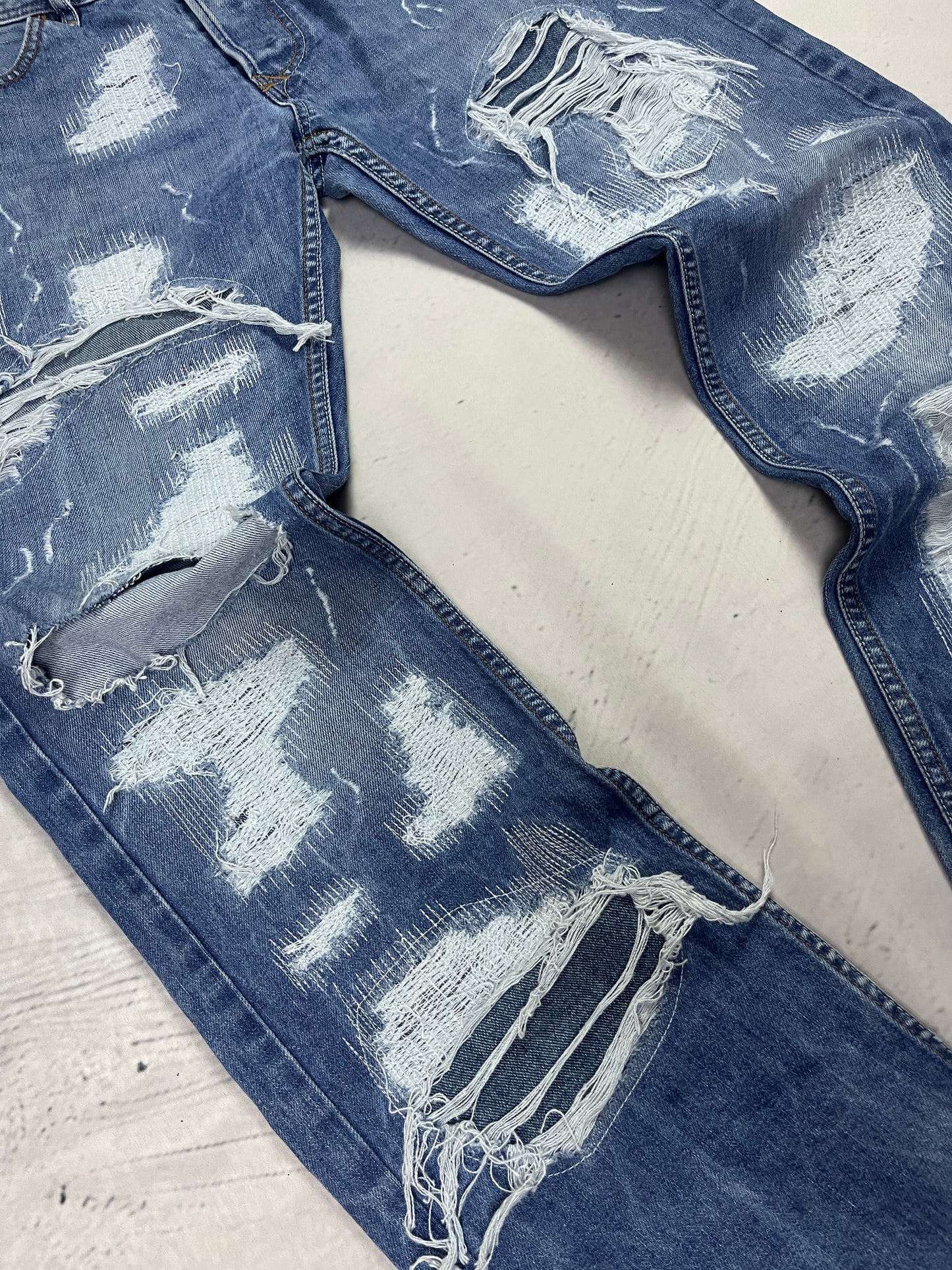 GLITCHED REPAIR DENIM